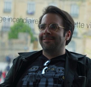 Writer James Tynion IV at a 2025 signing event in France