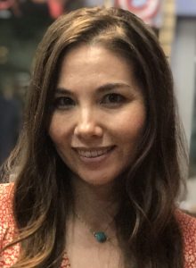 Writer Marjorie Liu at a 2019 signing for Monstress